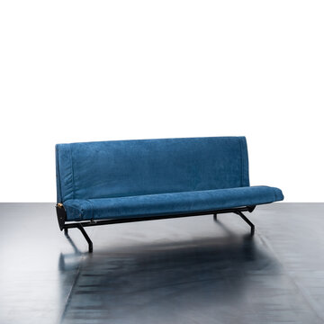 1950s designer sofa upholstered in blue fabric with reclining structure.