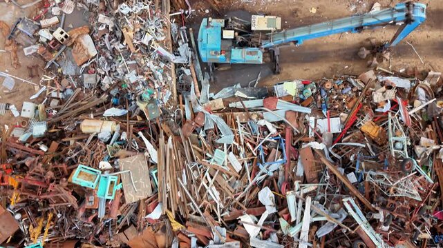 Aerial view of scrap metal recycling facility with industrial machinery in Agnesberg, Gothenburg, Vastra Gotaland Count, Sweden.