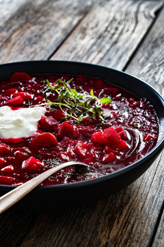 Ukrainian borscht on wooden table
