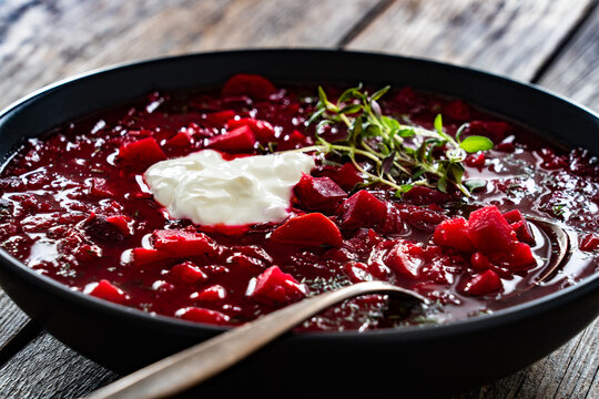 Ukrainian borscht on wooden table
