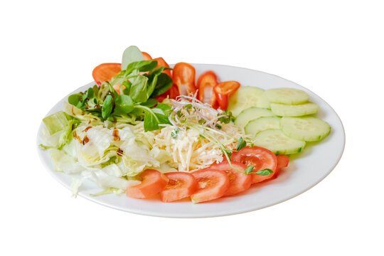 Fresh mixed salad on white plate with transparent background