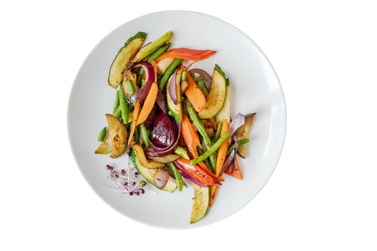 Grilled vegetables plate with zucchini carrots green beans onion