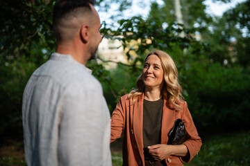 Fototapeta premium Kaja kallas engaging in outdoor park conversation