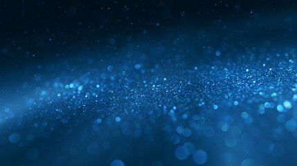 Abstract blue glitter bokeh background. Glowing particles and magic light sparkles on dark blue texture, dark blue gradient backdrop, creating a deep atmospheric © Russell Edwards