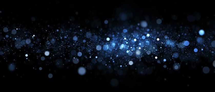 Blue bokeh lights and glowing glitter trail on dark background. Horizontal particle wave banner overlay effect for wide banner designs, sci-fi energy flows,  festive lighting overlays