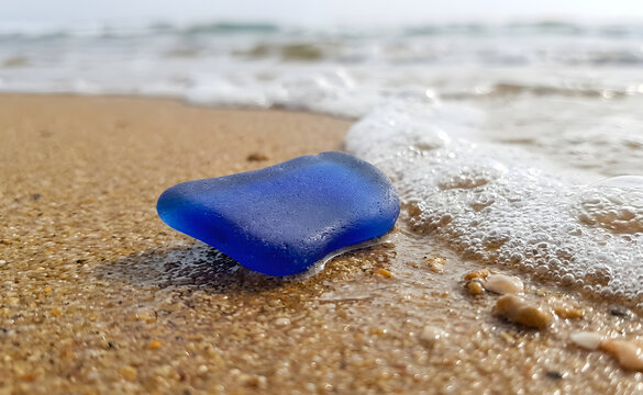 Frosted Sea Glass on Beach Sand