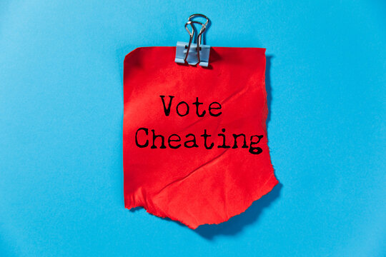 Vote cheating text with marker, concept background