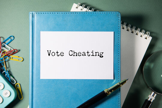 Vote cheating text with marker, concept background