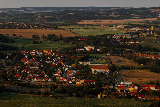 Scenic aerial view of Unterwellenborn surrounded by nature at dusk