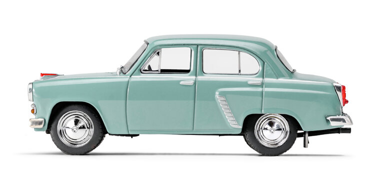 Blue retro toy car isolated on white