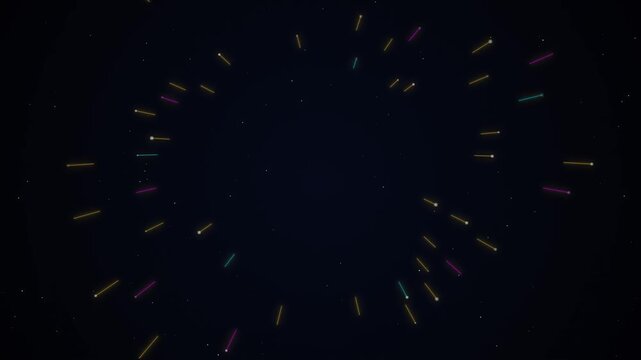 Colorful firework explosion bursting with looping rays against a dark night sky