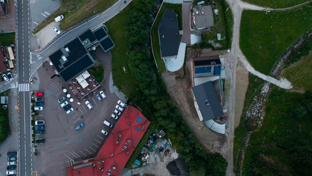Aerial view of rural road, road junction in a mountain village