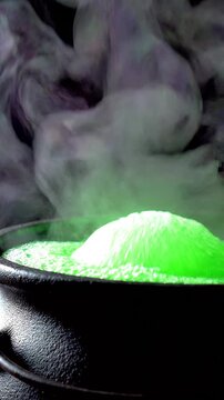 Iron Witch Cauldron Filled With A Glowing Green Potion