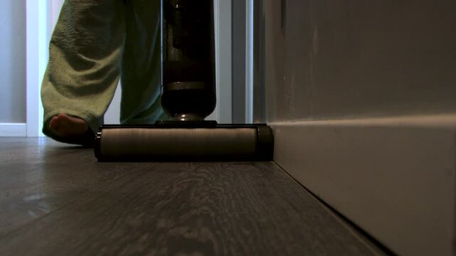 Vacuum Mop Leaves Uncleaned Strip Along Baseboard