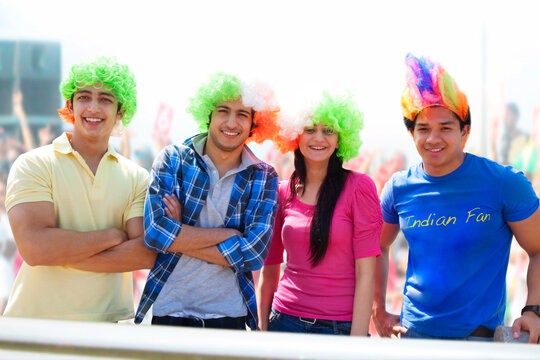 Portrait of friends with wigs 