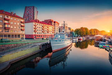 Marvelous morning view of old white warship on Danes river. Exciting summer cityscape of Klaipeda town, Lithuania, Europe. Adorable outdoor scene of Danes river. Traveling concept background. © Andrew Mayovskyy