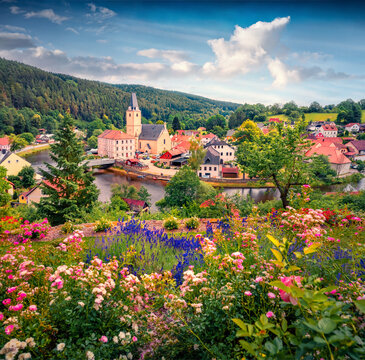 Wonderful summer view of Catholic church of Rozmberk village. Stunning morning cityscape of Rozmberk nad Vltavou village, Czech Republic, Europe. Traveling concept background.