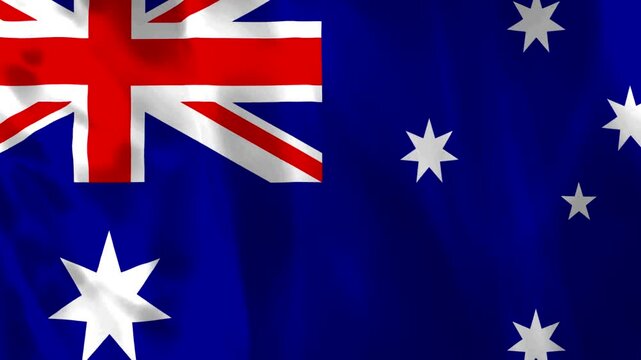 Waving national flag of Australia with blue background and white stars featuring red and white cross pattern