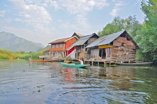 Kashmir with Dal freshwater lake in the city of Srinagar with Houseboats and shikaras on the lake, India
