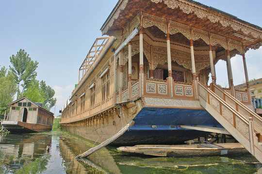 Kashmir with Dal freshwater lake in the city of Srinagar with Houseboats and shikaras on the lake, India