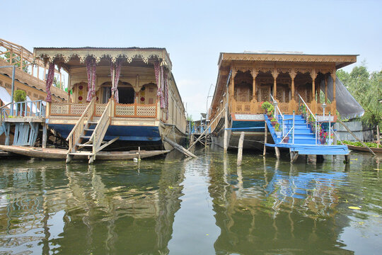Kashmir with Dal freshwater lake in the city of Srinagar with Houseboats and shikaras on the lake, India