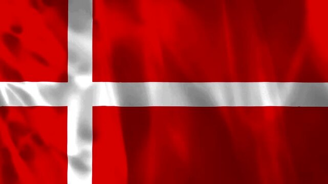 Waving fabric texture of the national flag of Denmark featuring a white cross on a red background