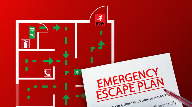 Emergency evacuation plan showing escape routes and exits in a building layout for safety preparedness