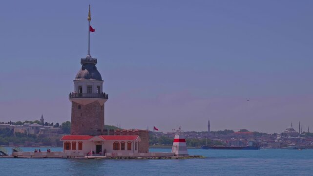Maiden's Tower and Cargo Ship Passing Through the Bosphorus with Topkapi Palace and Eminonu