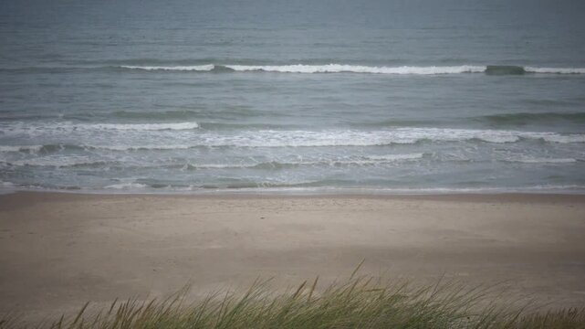 Hirtshals, Denmark A view of the North Sea on a windy day from a sand dune. 