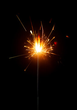 Light a Sparkler for fun in festival on black background