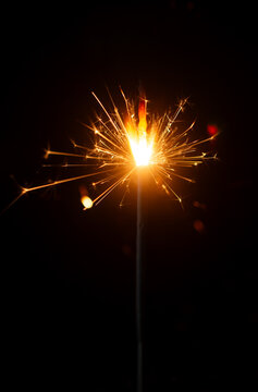 Light a Sparkler for fun in festival on black background