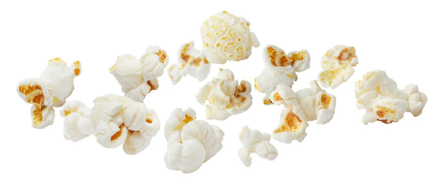 Fluffy popcorn pieces floating in air, isolated on transparent cutout background