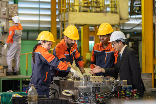 Mold engineering team planning plastic injection mold development and improvement