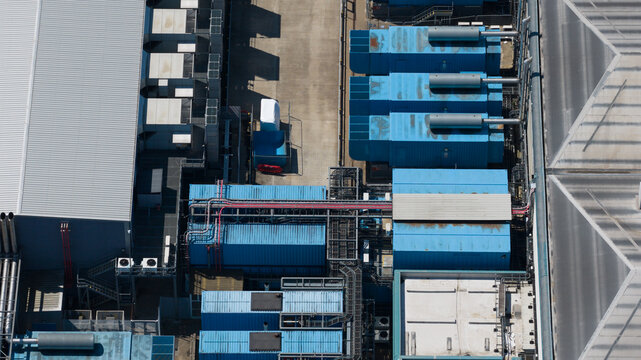 Aerial view reveals a datacenter with backup generator and hvac