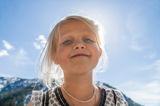 Austria, Tyrol, Lake Plansee, portrait of smiling girl