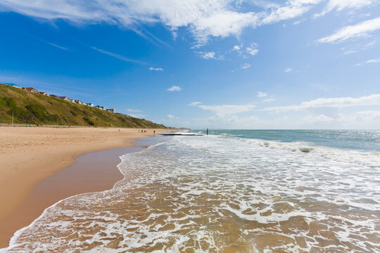 The sea meets the sandy beach at Bournemouth in Great Britain