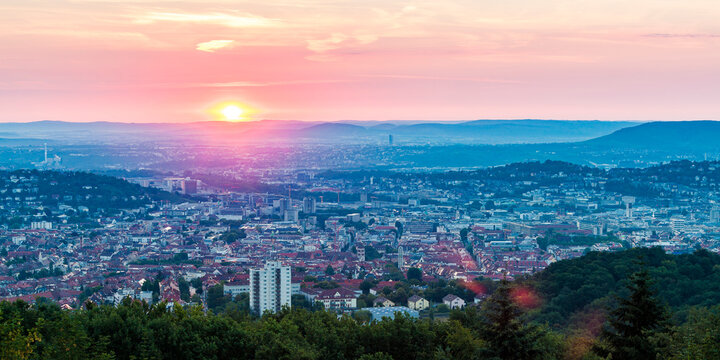 Germany, Baden-Wuerttemberg, cityscape of Stuttgart at sunrise, view from Birkenkopf