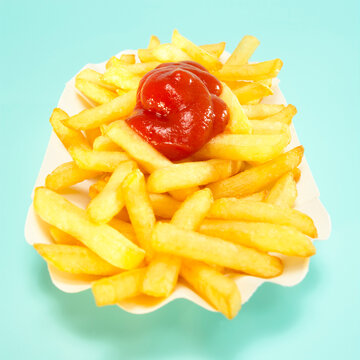 French fries with tomato ketchup, close-up