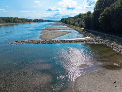 Aerial view of the Rhine at low water . Prolonged dry weather is causing extremely low water levels on the Rhine. This is having a significant impact on inland shipping. Rhineland-Palatinate, Germany.