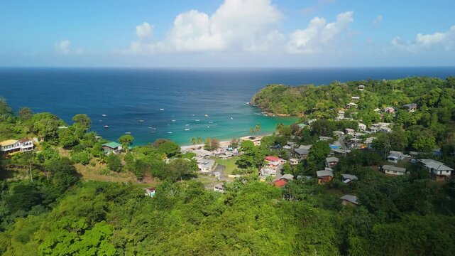 Castara Bay, Tobago, Trinidad and Tobago, fishing village, Castara village, anchored boats, turquoise bay, coastal town, colorful houses, hillside village, Caribbean bay, fishing boats, tropical villa
