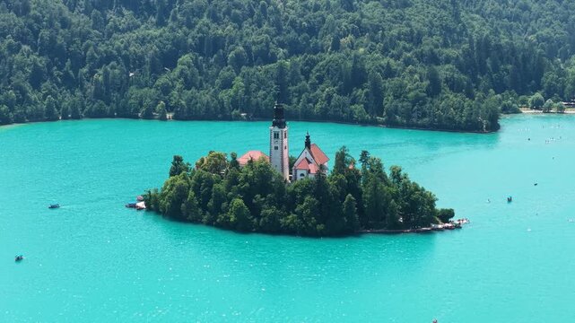 Drone Shot of Lake Bled Church on Island in Turquoise Water on Sunny Summer Day, Slovenia