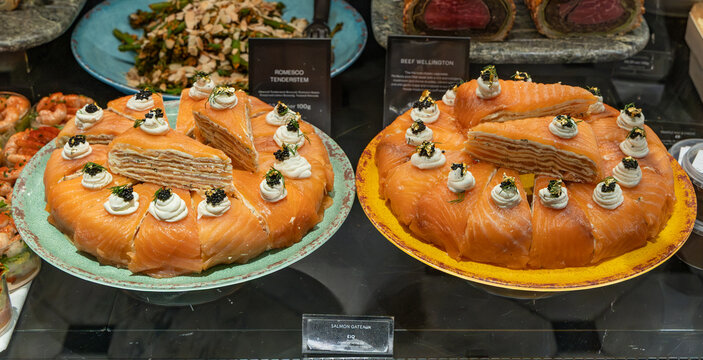 Smoked salmon crepe cake features delicate thin cr&ecirc;pes or pastry layers filled with cream cheese, cream, and smoked salmon.