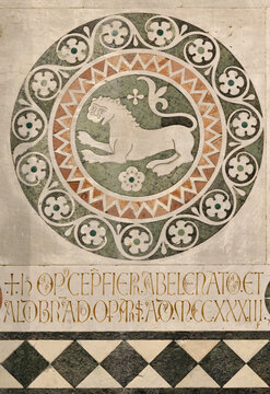 LUCCA, ITALY - JUNE 23, 2026: The detail of medieval marble intarsia (lion) of church Cattedrale di San Martino by unknown artist (1210 &ndash; 1230).