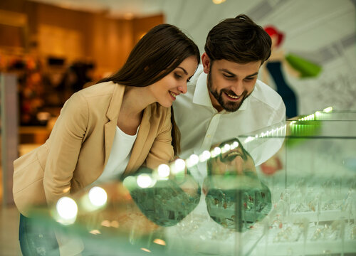 Couple Browsing Jewelry Display.
