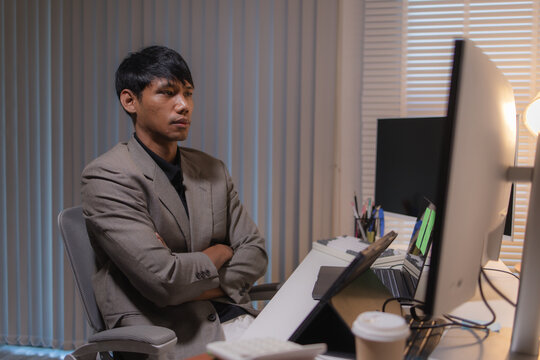 Professional stock trader reviewing market charts with sticky notes across multiple monitors, laptop, and tablet to analyze price trends, plan trading strategies, and manage investment decisions.