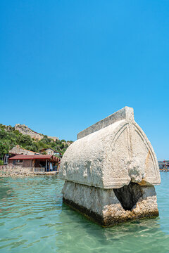 Turquoise waters and ancient Lycian coast of Kekova Island during a boat cruise in Antalya, Turkey.