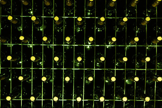 Wine Bottles at a Winery, Bottled Wine Production and Storage in a Traditional Cellar