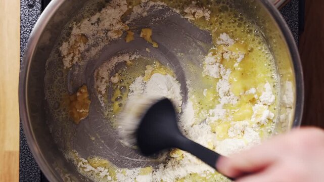 Flour and butter are stirred in saucepan for smooth roux. Roux cooks slowly to remove raw flour taste and build rich sauce base. Use roux for b&eacute;chamel, velout&eacute;, gravy, soup, stew or creamy casserole.