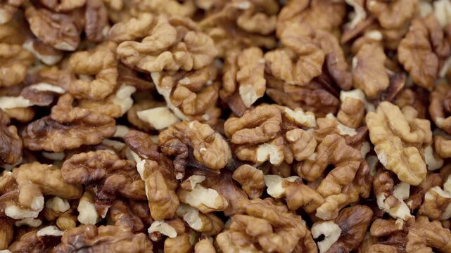 Walnut kernels isolated on white background. Walnuts close-up. Healthy eating. Half of walnut isolated. Peeled walnut on white.	
