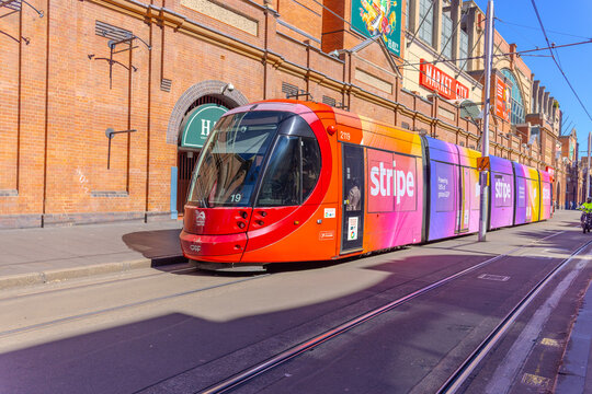 11 August 2026 Tram moving through George Street iChina Town in Sydney CBD NSW Australia